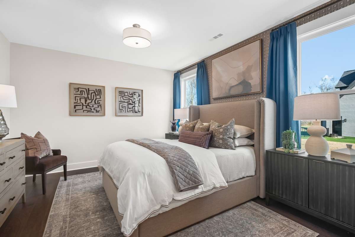 Photos shown are of a model home and are for illustrative purposes only. The actual home will vary in finishes, materials, colors, options, and upgrades. Buyers should verify all features and selections prior to purchase.