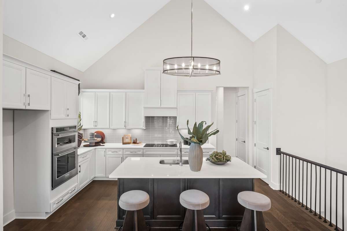 Photos shown are of a model home and are for illustrative purposes only. The actual home will vary in finishes, materials, colors, options, and upgrades. Buyers should verify all features and selections prior to purchase.