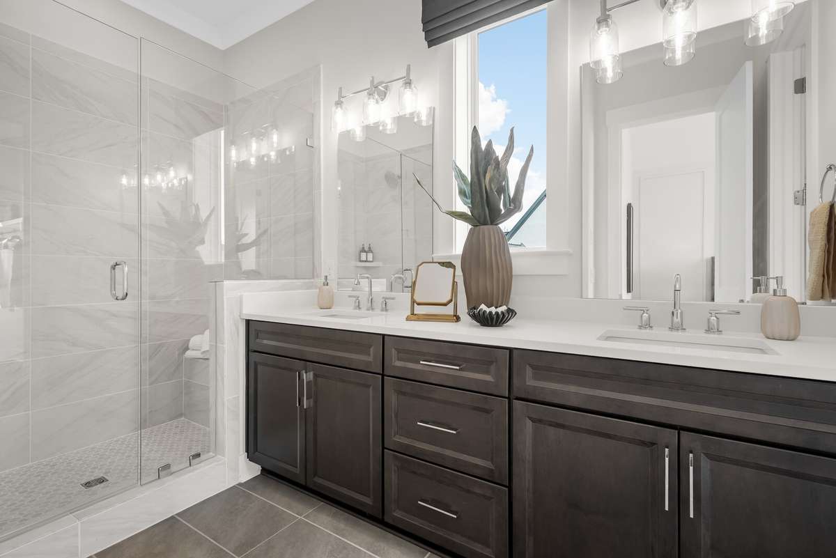 Photos shown are of a model home and are for illustrative purposes only. The actual home will vary in finishes, materials, colors, options, and upgrades. Buyers should verify all features and selections prior to purchase.