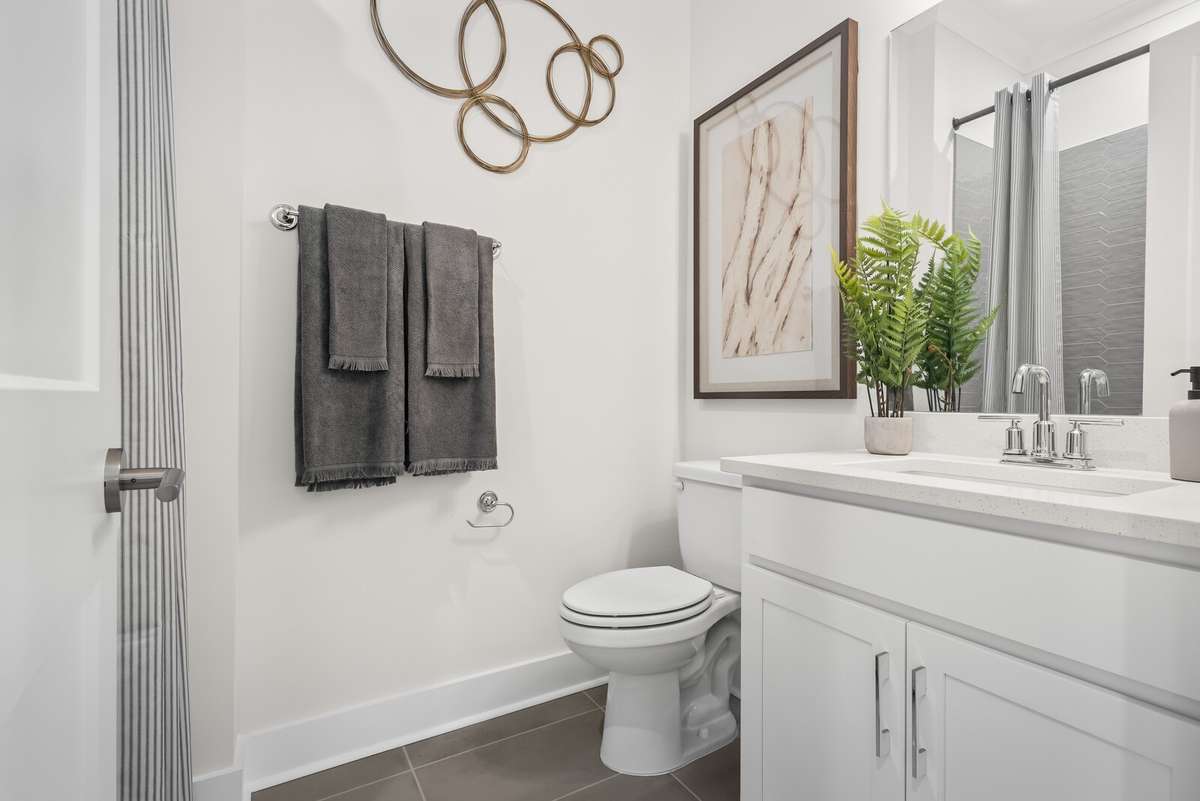 Photos shown are of a model home and are for illustrative purposes only. The actual home will vary in finishes, materials, colors, options, and upgrades. Buyers should verify all features and selections prior to purchase.