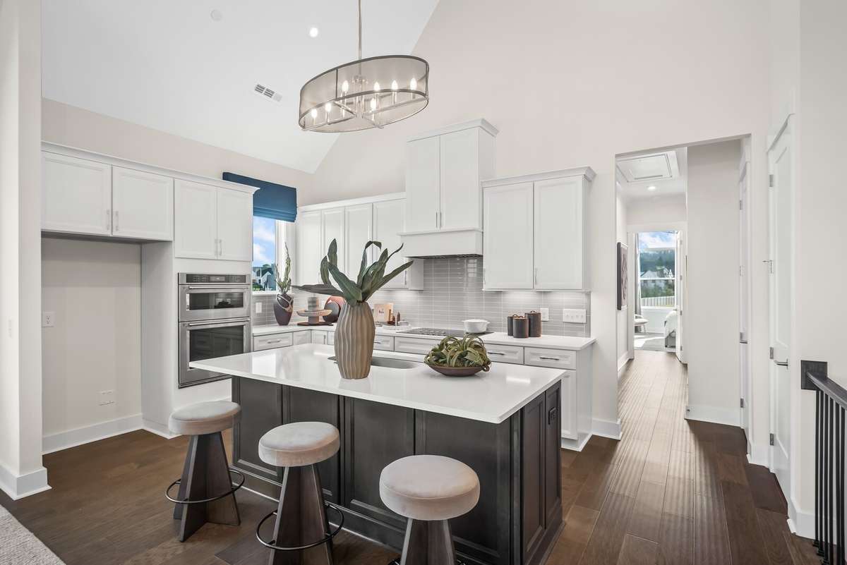 Photos shown are of a model home and are for illustrative purposes only. The actual home will vary in finishes, materials, colors, options, and upgrades. Buyers should verify all features and selections prior to purchase.