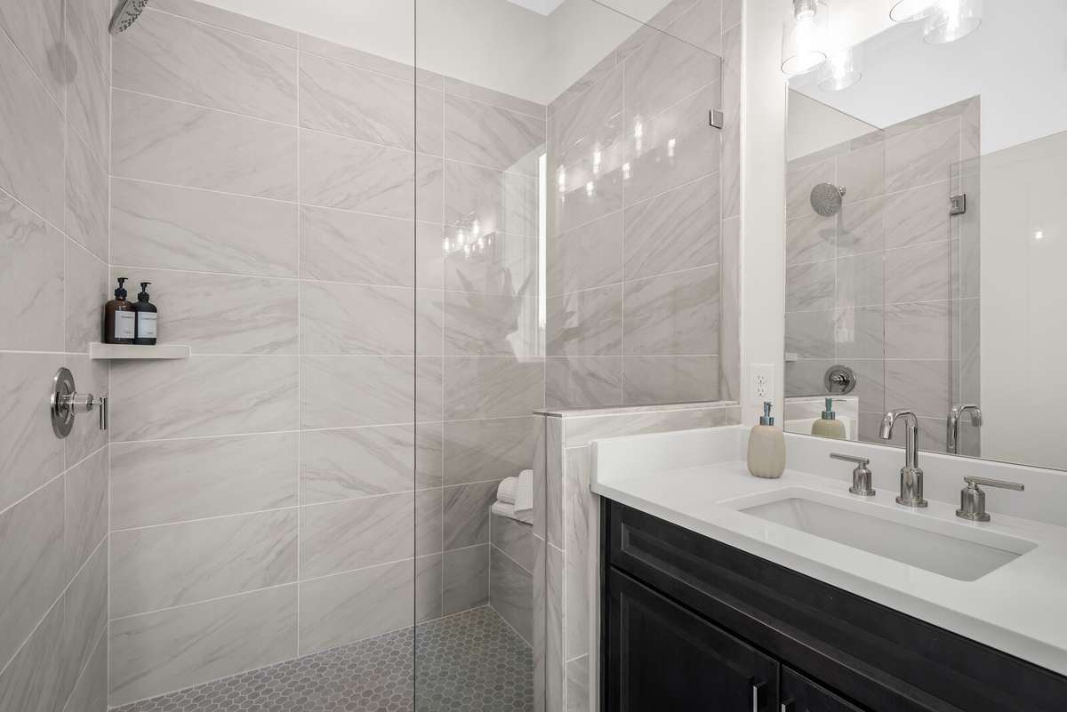 Photos shown are of a model home and are for illustrative purposes only. The actual home will vary in finishes, materials, colors, options, and upgrades. Buyers should verify all features and selections prior to purchase.