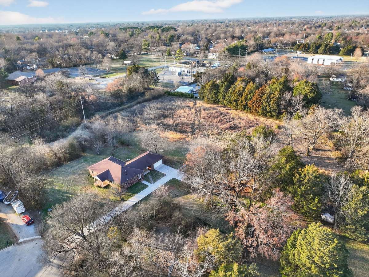 Quaint home in the middle of town with large lot