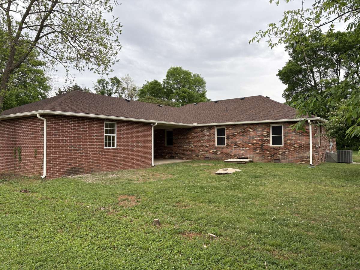 This picture shows new gutters and new roof. Professional update coming soon.