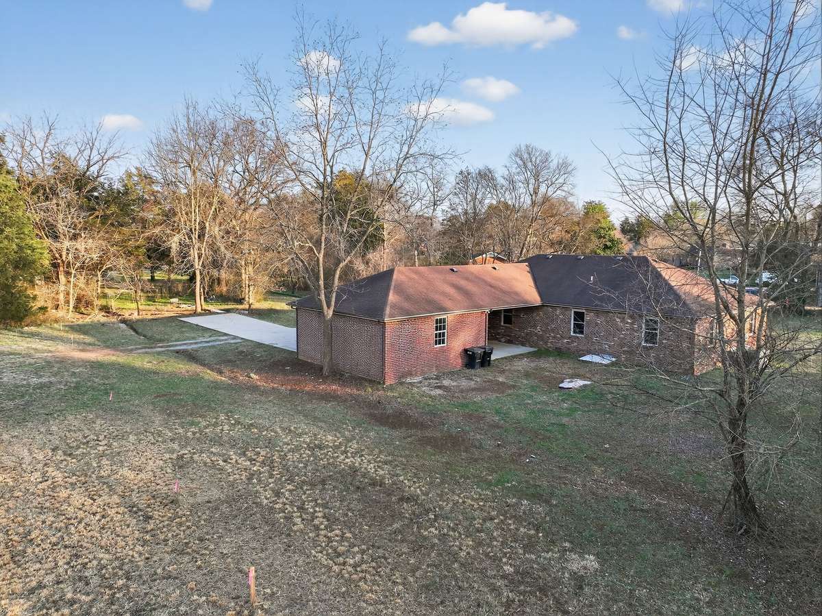 Carport and garage for ease of parking. Home has a new roof and gutters since this picture was taken.