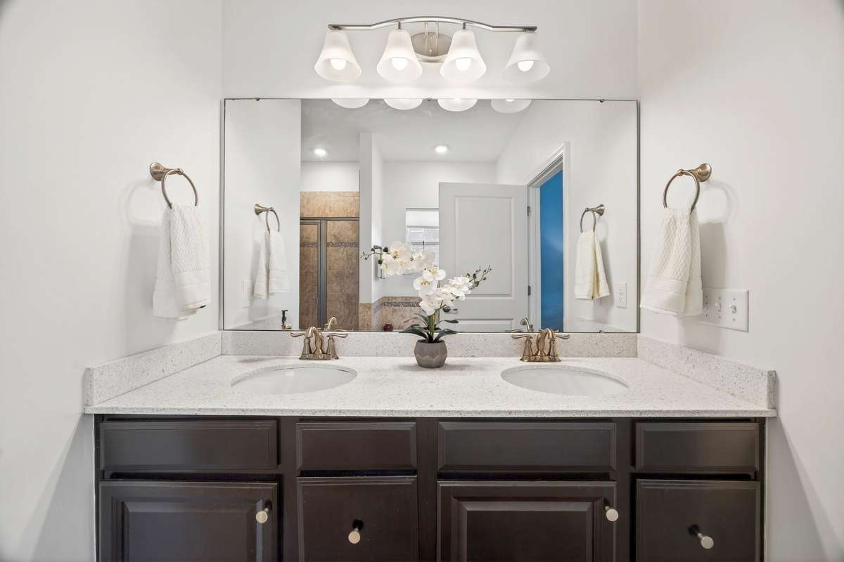 Double vanities and granite counters.