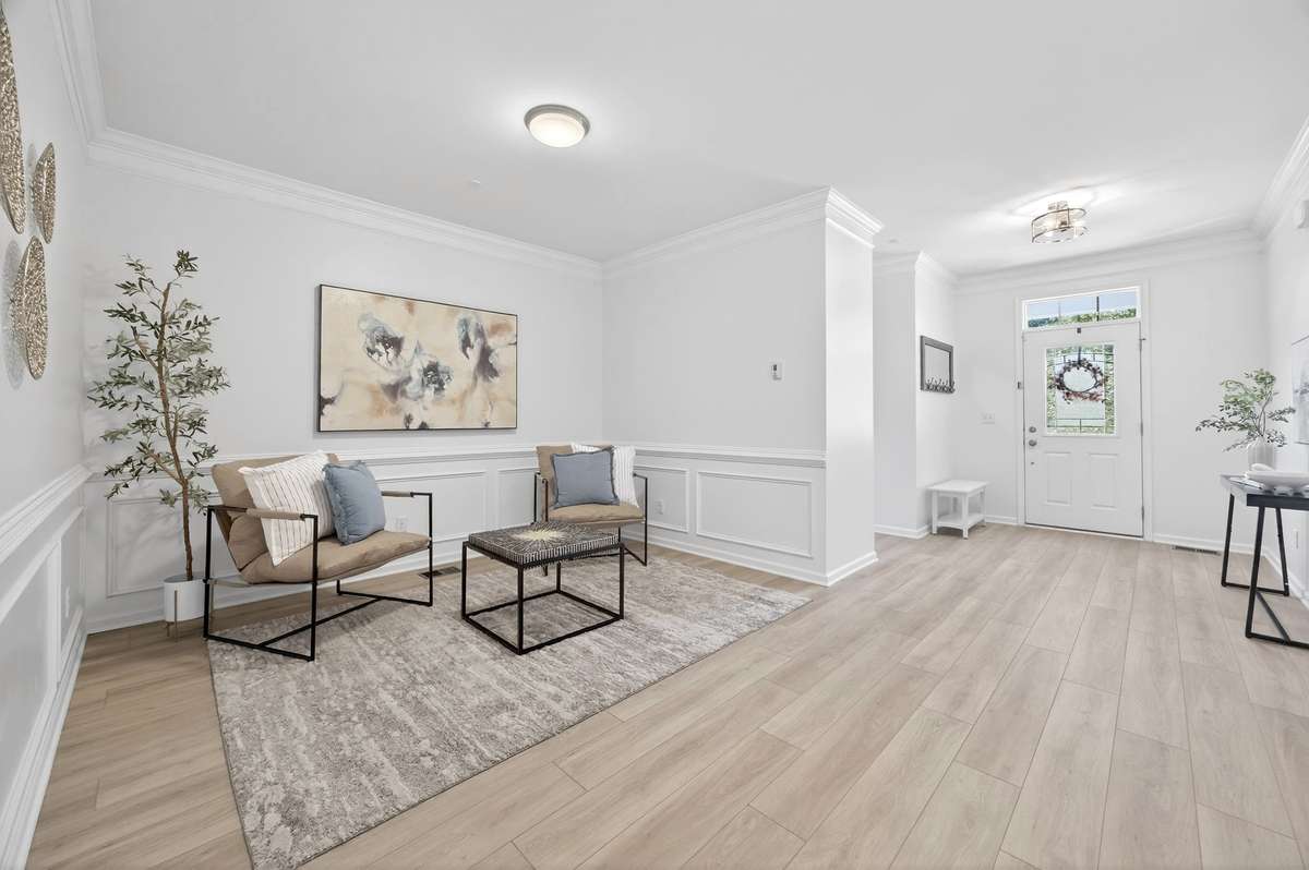 Welcome home! The impressive, light-filled entry creates a grand first impression and seamless flow into the main living areas.