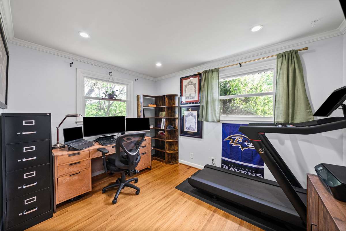 Bedroom 3 is currently being used as an office and offers plenty of natural light.