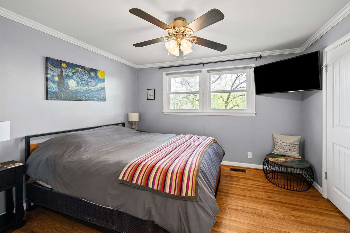 Bedroom 2 offers a private en suite half bath.