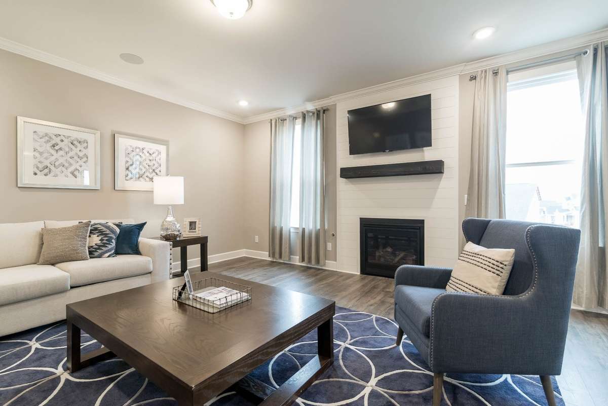 Great room*Photos are of a model home of a similar floorplan. Actual colors, structural selections, and finishes may vary.