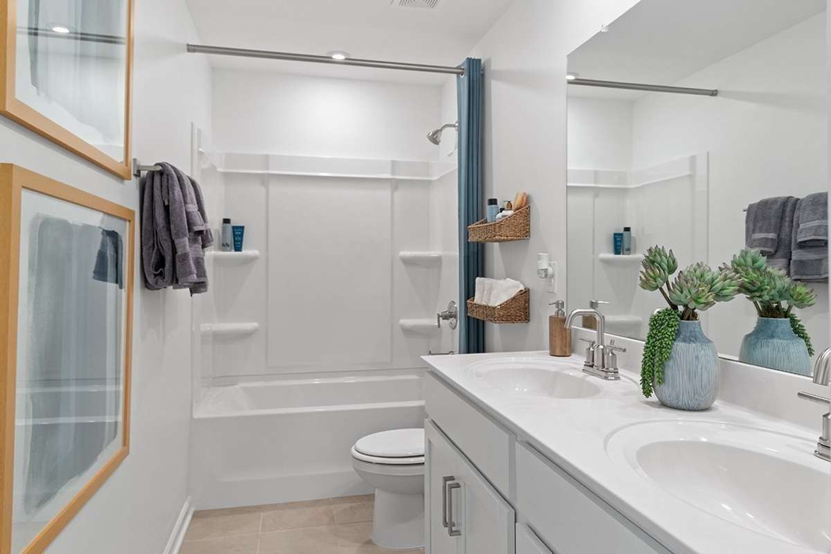 *Photo taken of Model Home. Selections & Colors may vary*