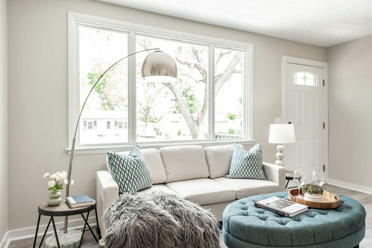 Neutral finishes throughout the living room provide a clean backdrop that complements any design style or décor.