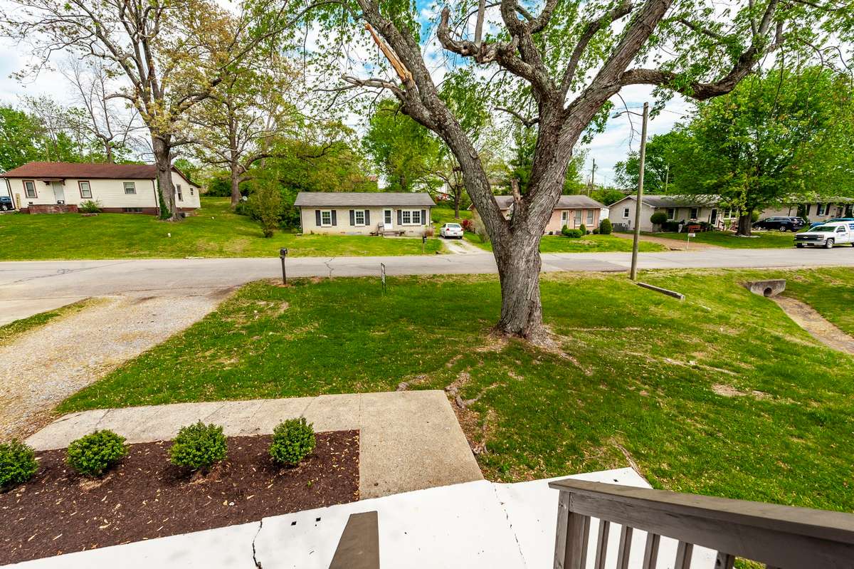 The simple, well-maintained landscaping enhances the home’s curb appeal while keeping the focus on the refreshed exterior design.