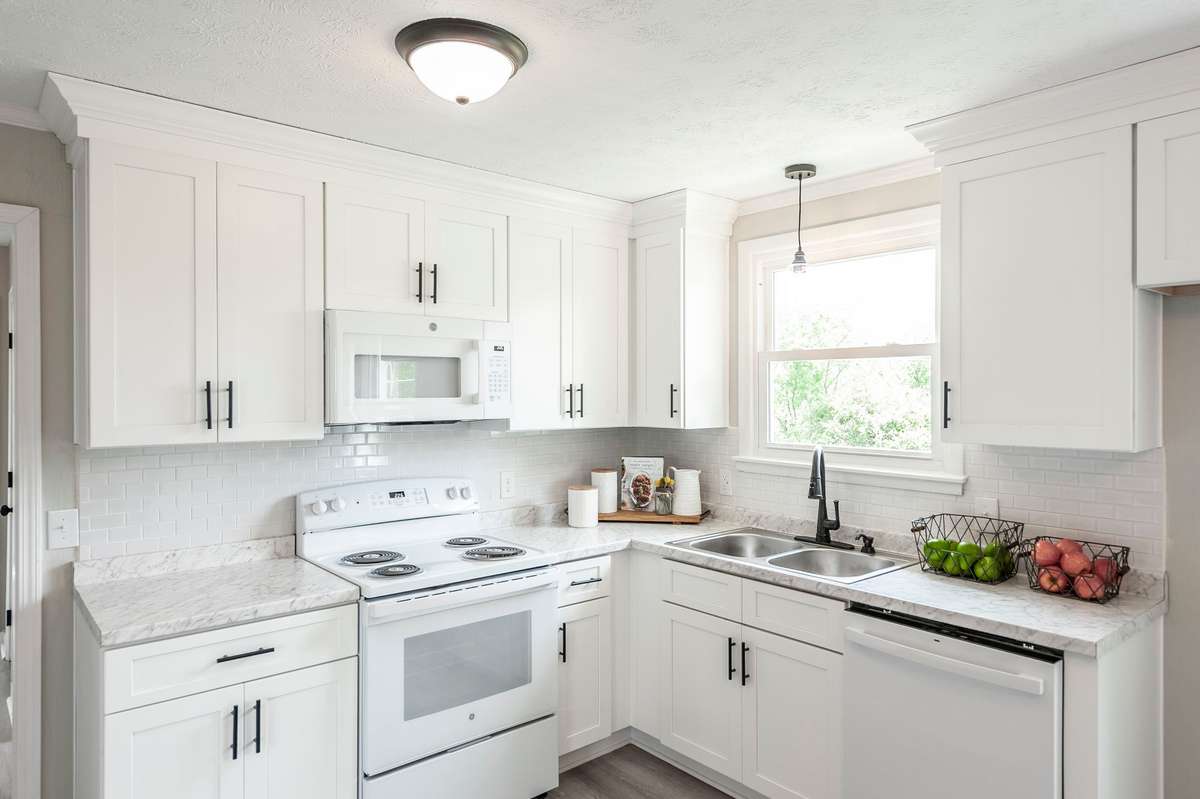 New appliances & modern fixtures add both style & functionality for everyday cooking & entertaining.
