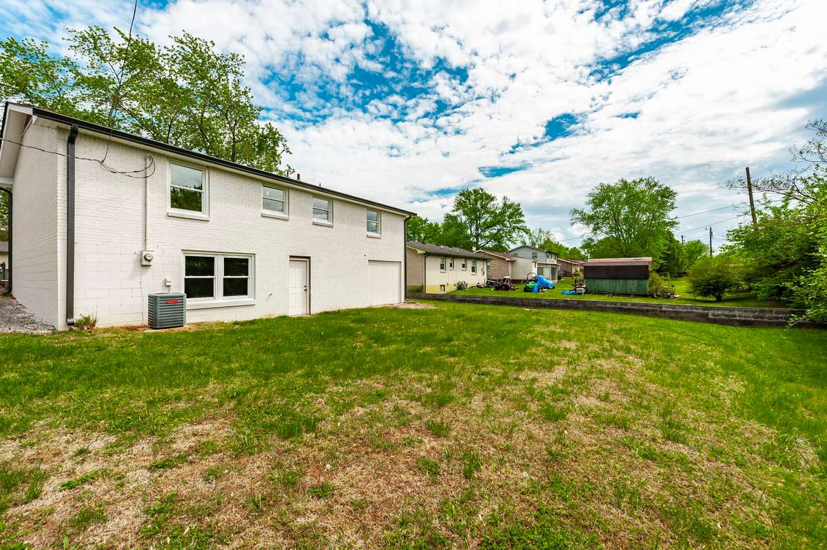The flat, usable backyard offers a rare blank canvas with endless possibilities for outdoor living & future improvements. With ample space to design, the yard is perfect for adding a patio or outdoor living area directly off the walkout basement.