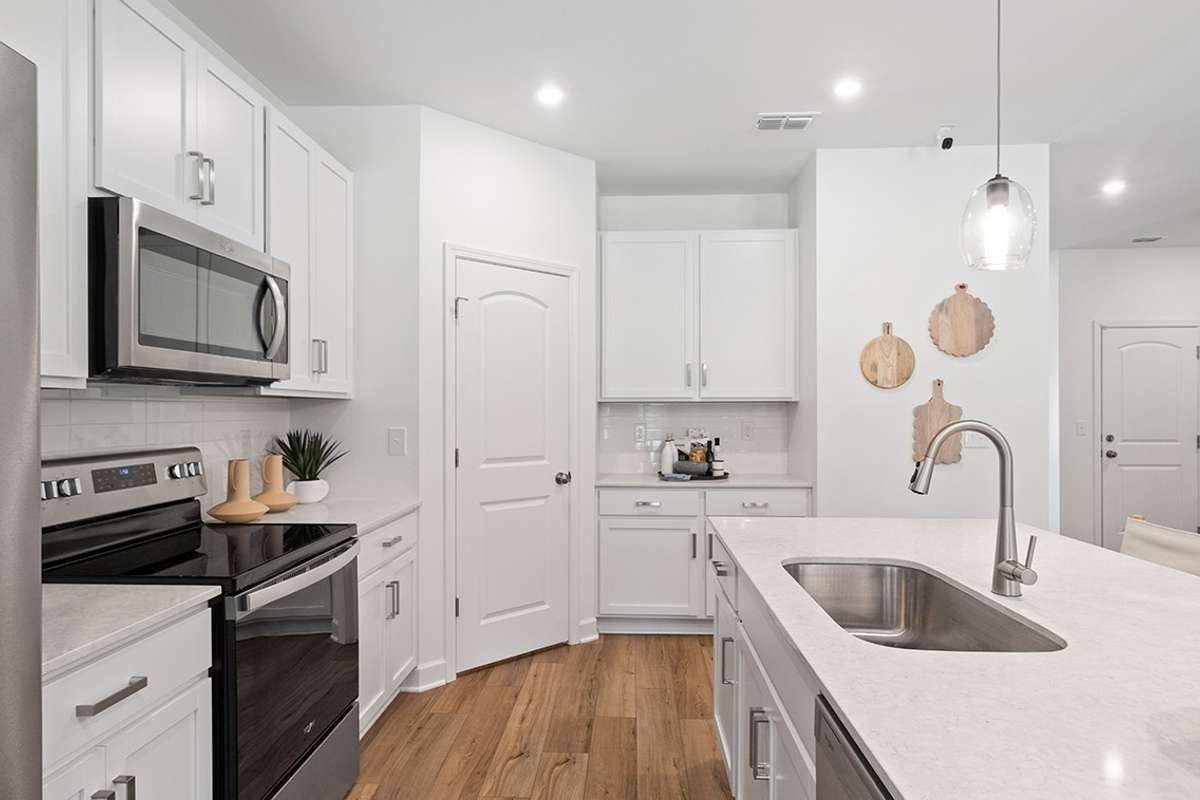 *Photo taken of Model Home. Selections & Colors may vary*