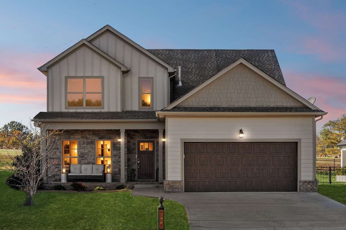 This home shines at dusk, with glowing windows and soft exterior lighting highlighting its warm curb appeal. Just minutes to all zoned schools and shopping, you won't have to sacrifice anything.