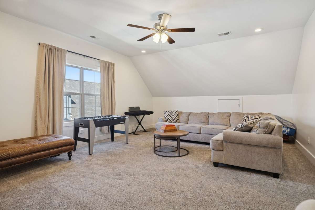 Your tour now takes you upstairs to the nearly 275-square-foot bonus room, offering plenty of space for you to enjoy in whatever way best suits your needs.