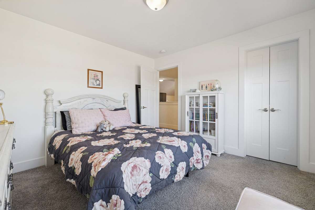 Bedroom three features its own walk-in closet and plenty of space to create a layout that suits any age or decor style.