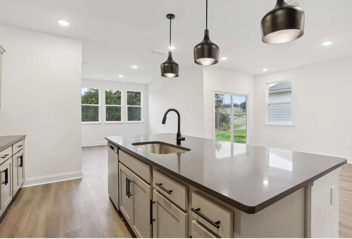 Blake kitchen and dining. Photos of similar home, same plan. Options may vary.