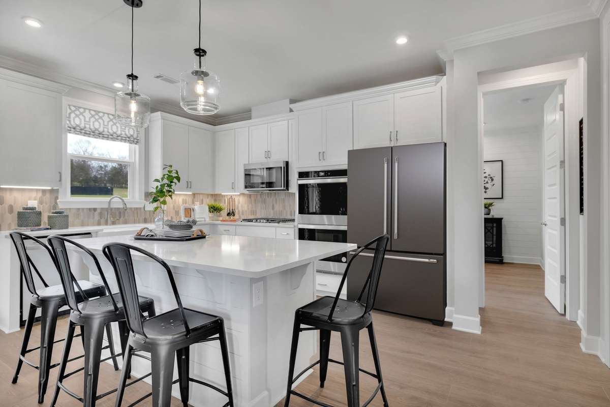 Stock Model Photo. Standard Enhanced Kitchen with Gas Cooktop and Double Oven!