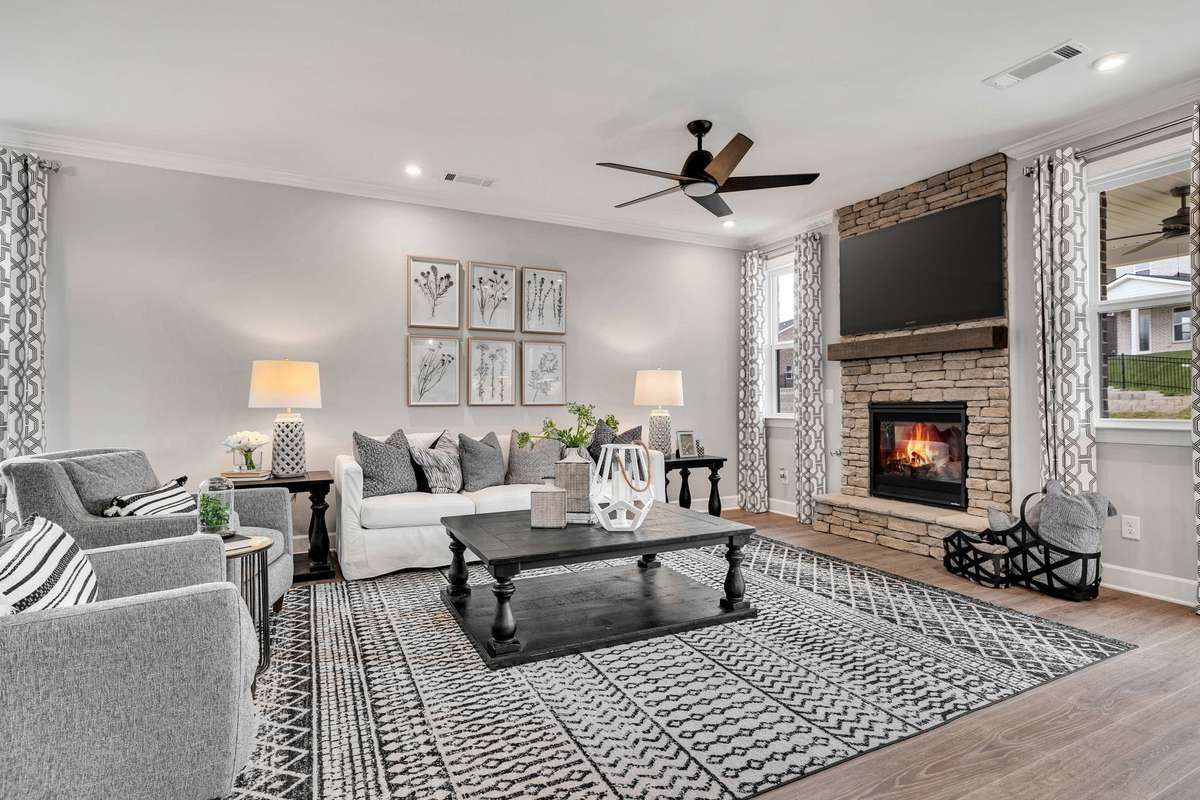 Stock Model Photo. Enjoy a movie night in this cozy Living Room!