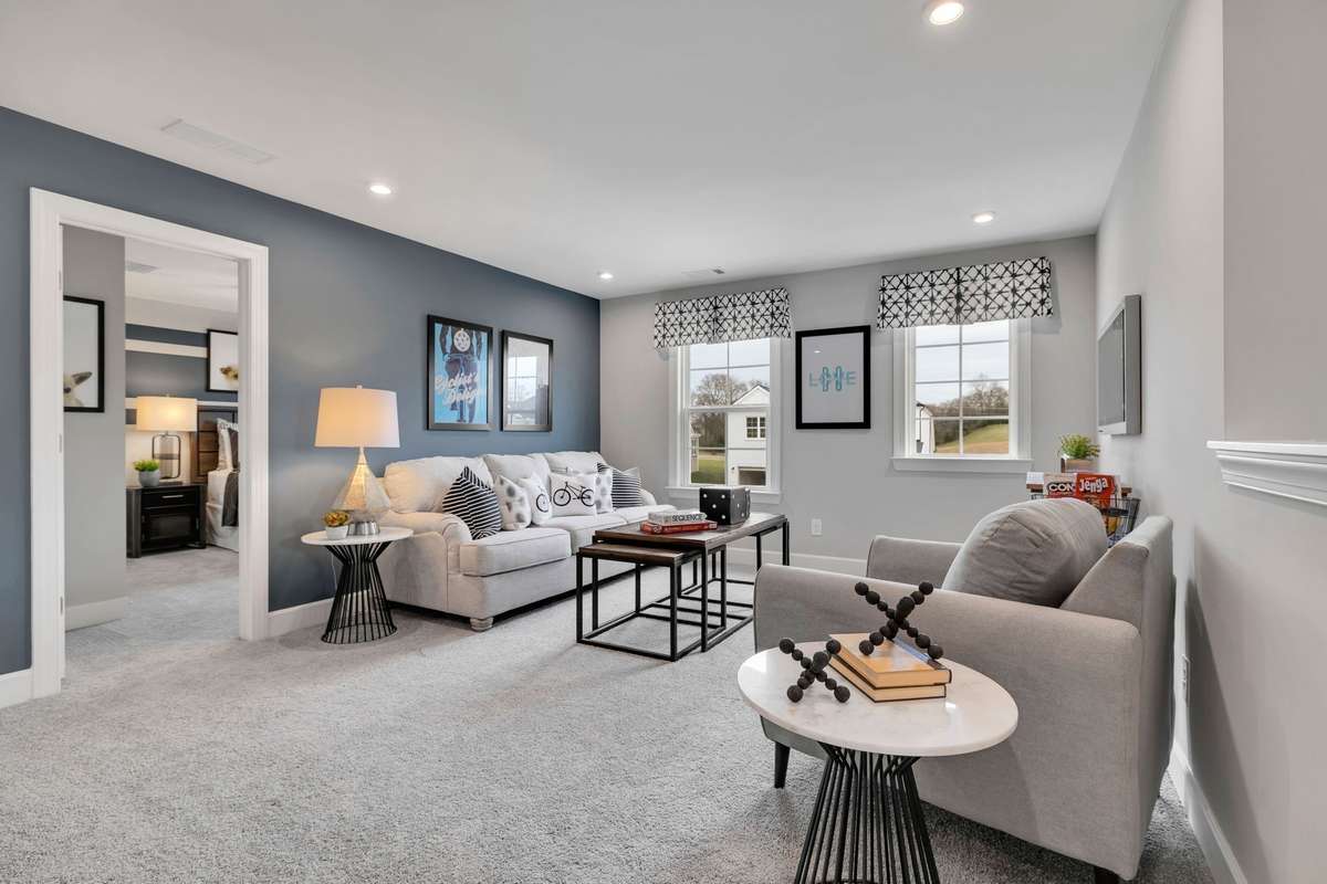 Stock Model Photo. Entertain in the spacious Bonus Room upstairs!