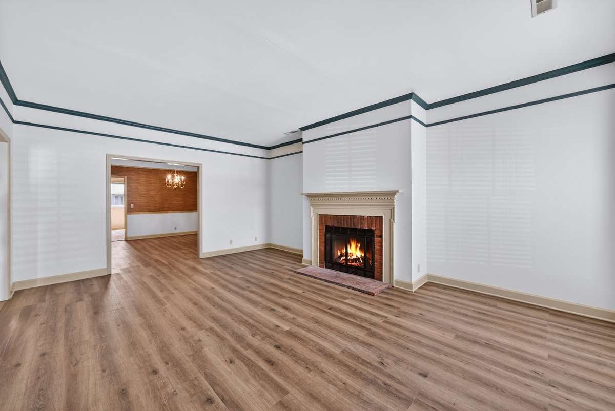 Fireplace virtually staged as on. Seller makes no guarantees on fireplace functionality.