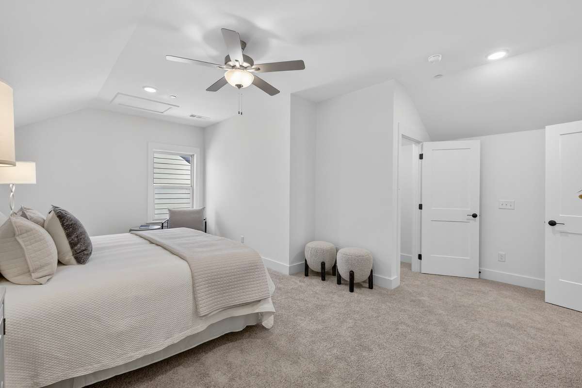 **Photos not of the actual home but of another Everleigh floor plan in The Knoll at Fairvue. Pictures to show the layout of bedroom 3 on the second level staged with furniture.**