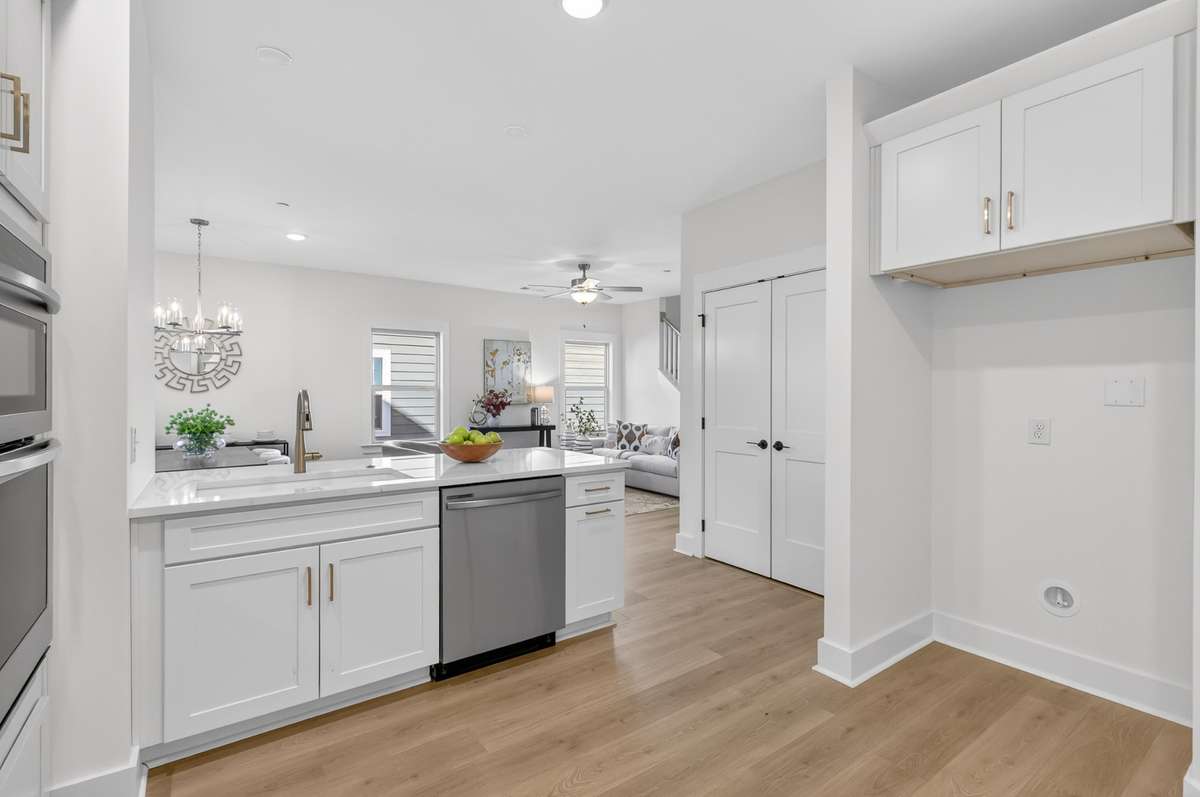**Photos not of the actual home but of another Everleigh floor plan in The Knoll at Fairvue. Pictures to show the layout of the kitchen.**