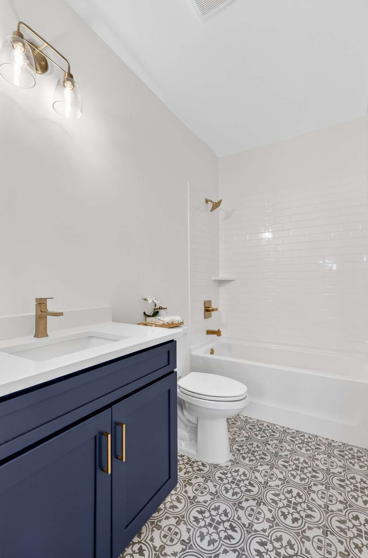 **Photos not of the actual home but of another Everleigh floor plan in The Knoll at Fairvue. Pictures to show the layout of the secondary bathroom on the main level.**
