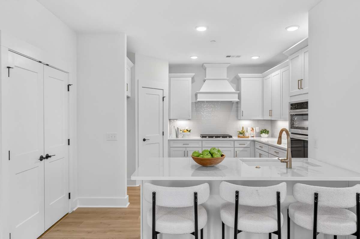 **Photos not of the actual home but of another Everleigh floor plan in The Knoll at Fairvue. Pictures to show the layout of the kitchen.**
