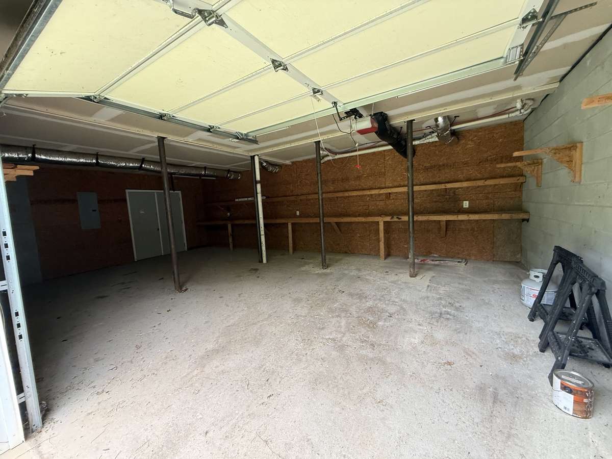 Large hidden workshop in back of garage