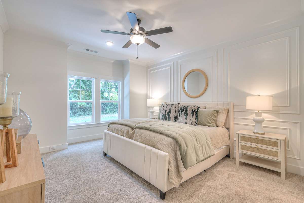 **Photos not of the actual home but of another Ashleigh floor plan in The Knoll at Fairvue. Pictures to show the layout of the Owners bedroom on the main level staged with furniture.**