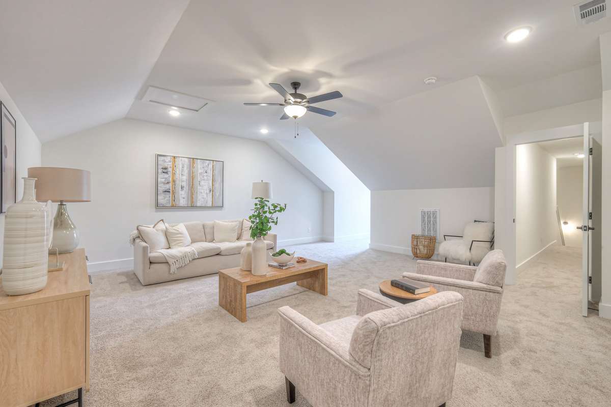 **Photos not of the actual home but of another Ashleigh floor plan in The Knoll at Fairvue. Pictures to show the layout of bedroom 3 on the second level staged with furniture.**