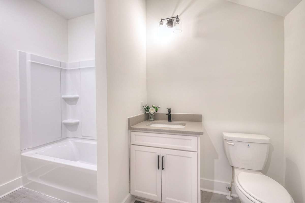 **Photos not of the actual home but of another Ashleigh floor plan in The Knoll at Fairvue. Pictures to show the layout of bathroom 3 on the second level.**