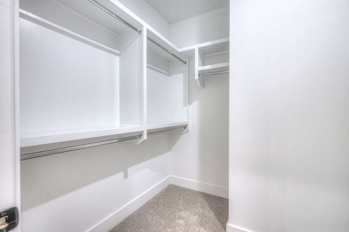 **Photos not of the actual home but of another Ashleigh floor plan in The Knoll at Fairvue. Pictures to show the layout of the Owners closet on the main level."