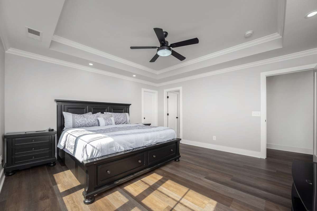 Natural light pours into this primary bedroom.