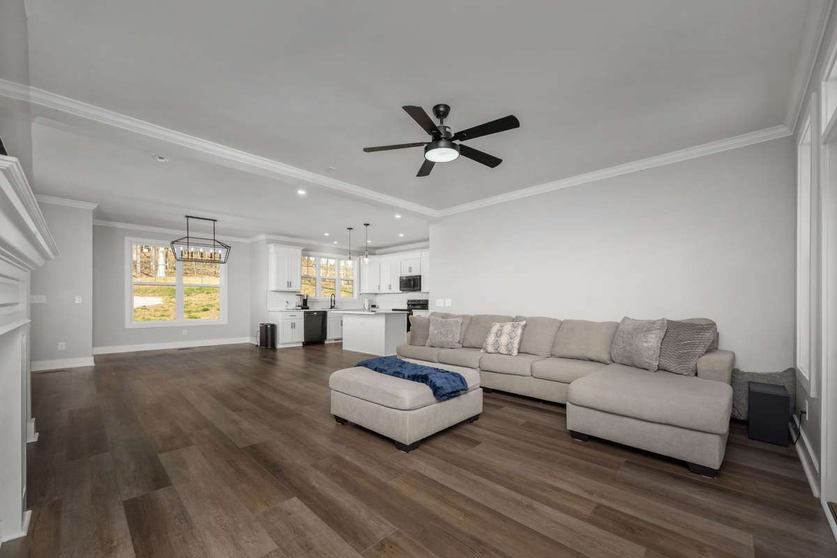 The living room flows right into the dining and kitchen, making it feel open and easy.