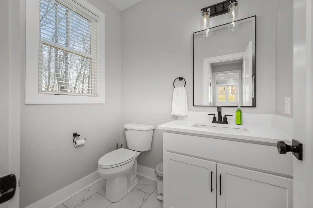Perfectly placed half bath for guests and everyday use.