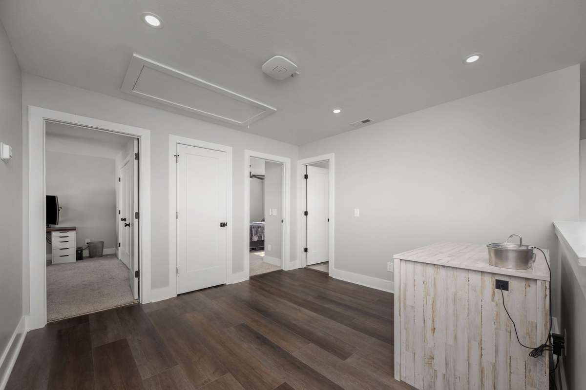 Open landing at the top of the stairs with space to make it your own.
