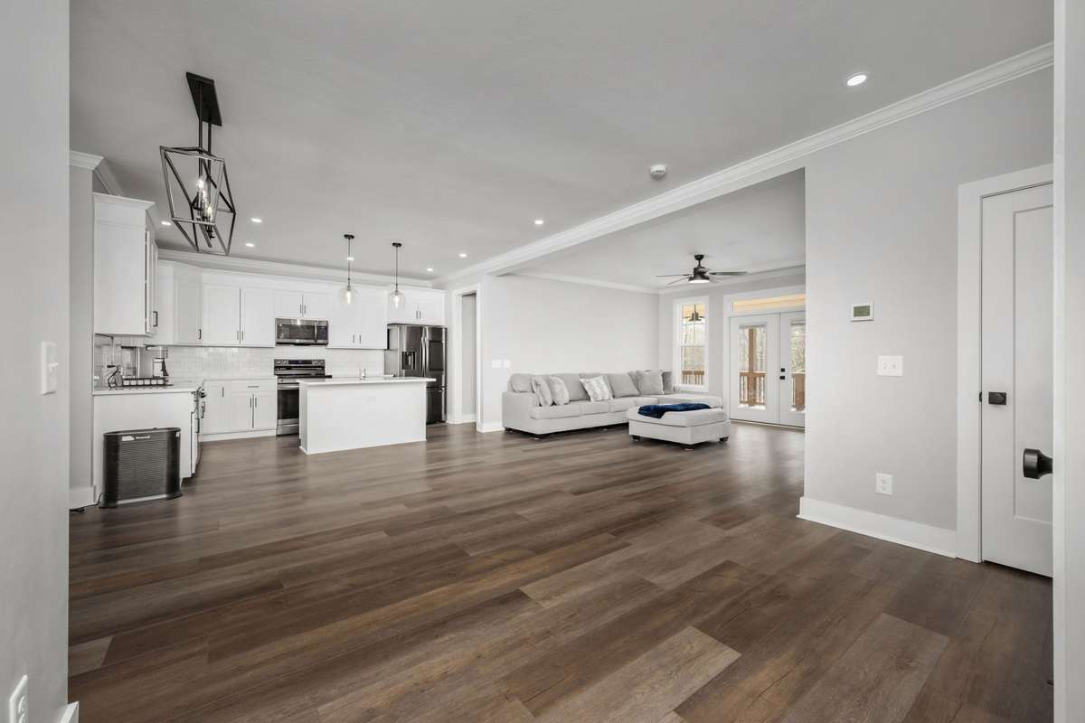 Welcoming entry that opens to dining and flows into the kitchen and living area, with extra storage.