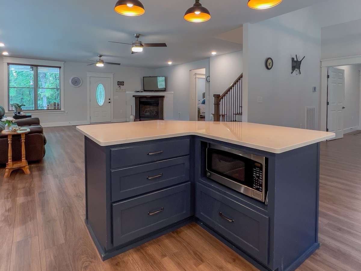 I love this Island. Enough room for 6 barstools!