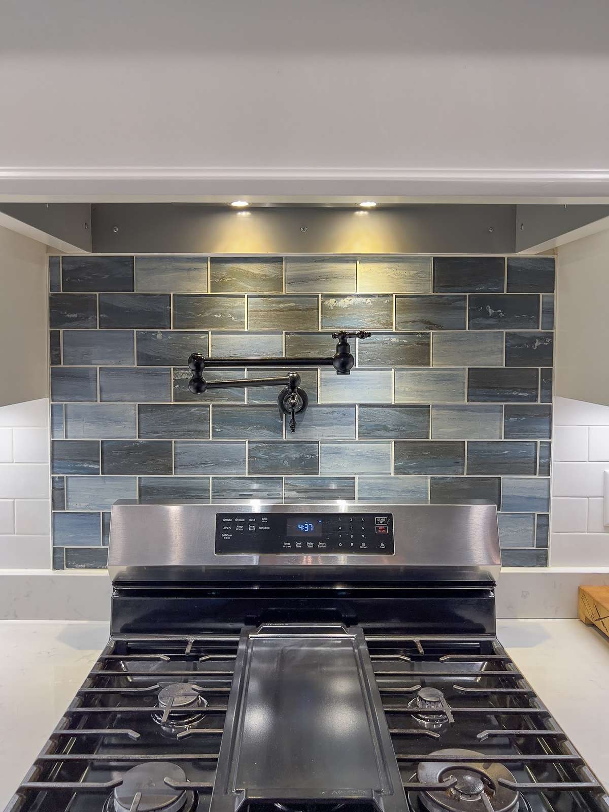 Articulate Tile work and a POT  Filler!