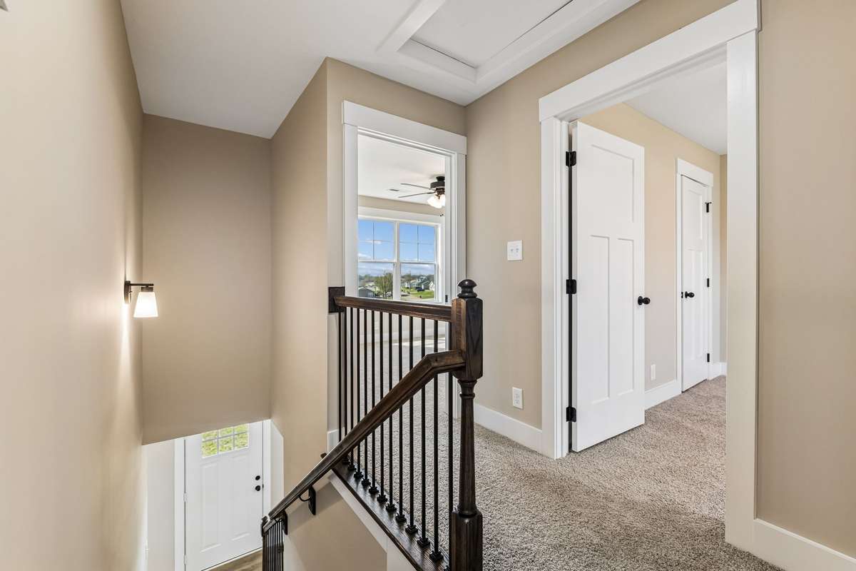 Sample photos from a previous build showing the Braxton Floor Plan.  Materials and colors are subject to change without notice.