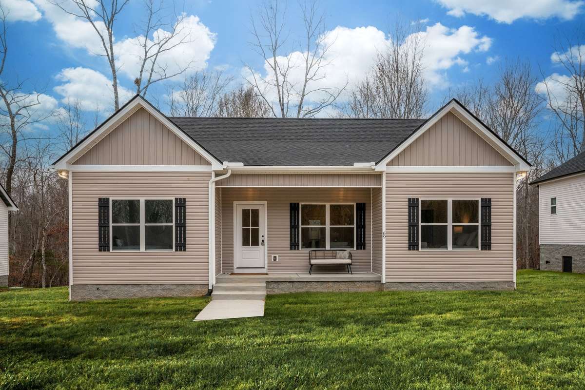 This Home is Absolutely Adorable Inside + Out!!!