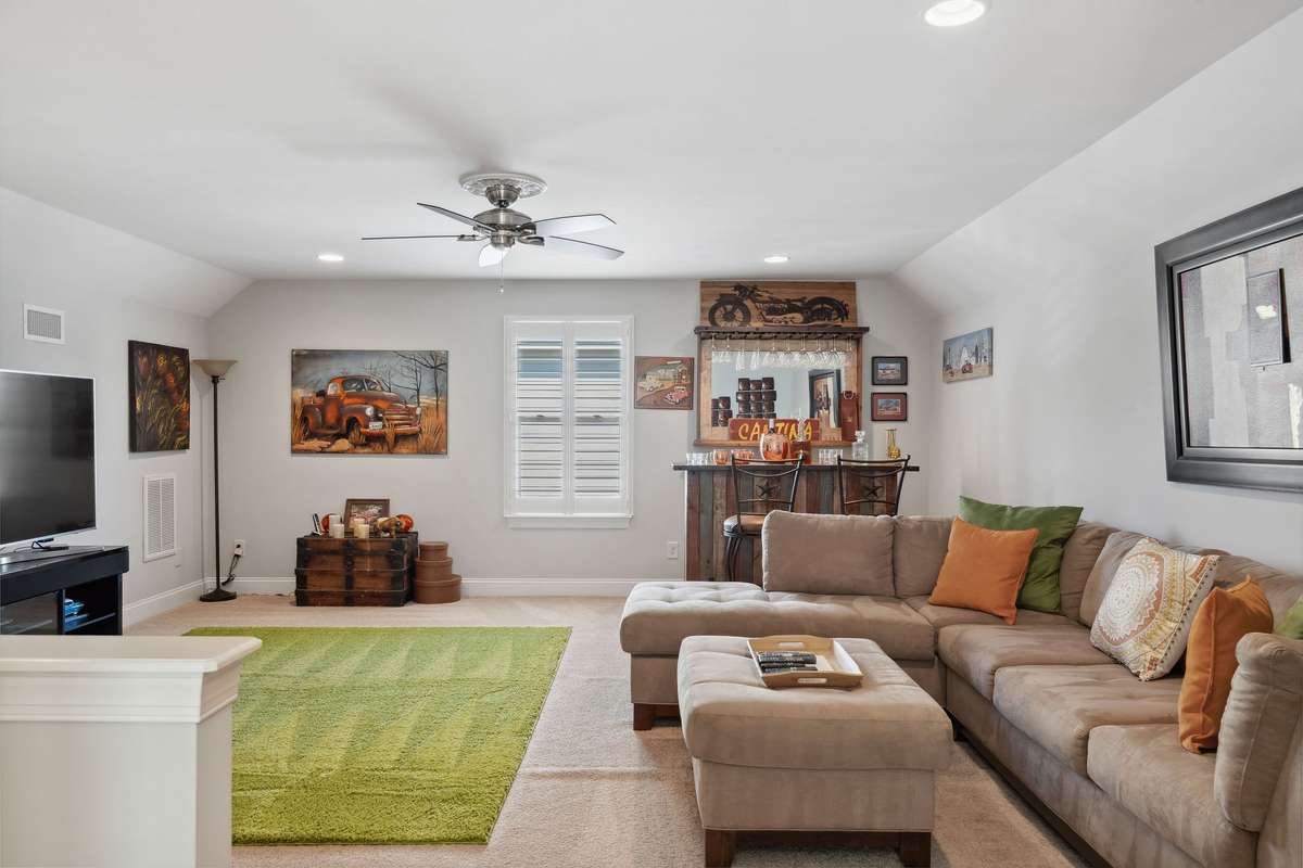 This bonus room is comfortable and can be the ideal space for movie night, game night, sports game days, or to show off your collectibles!