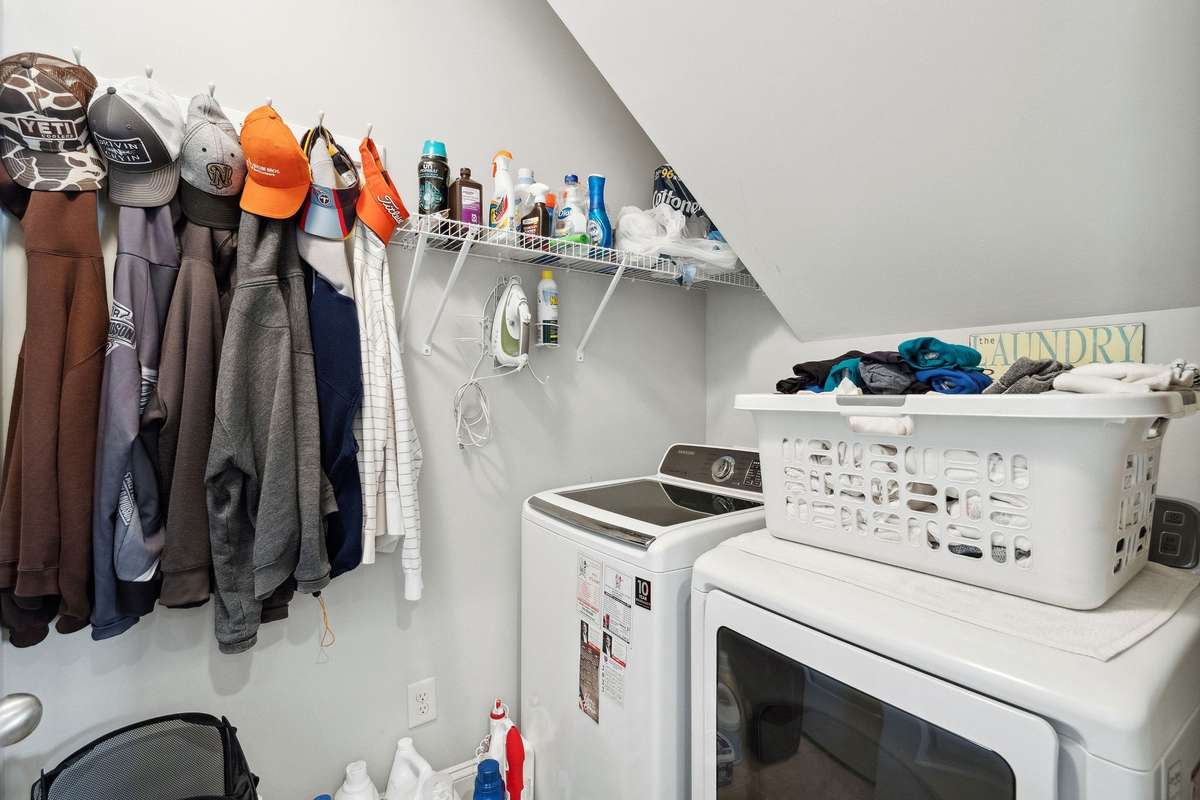 Laundry room can be found just off the kitchen/dining area.