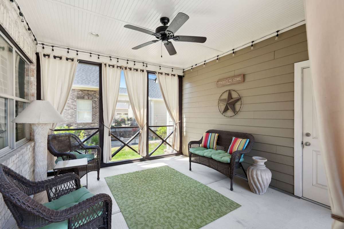 The current owners are using the enclosed breezeway as a relaxation location to enjoy the outdoors and be safe from the elements. The options for this space are endless.