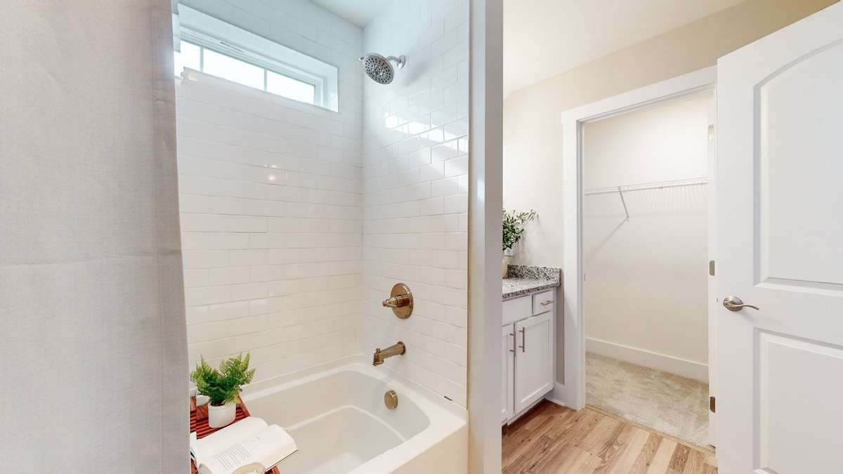Photo is similar home in the same community - 2&3 bedroom options - MOVE IN READY - - upgrades available. Model home open Wed-Sat 10-5 & Sun 1-5. Dog Park and Playground as amenities.